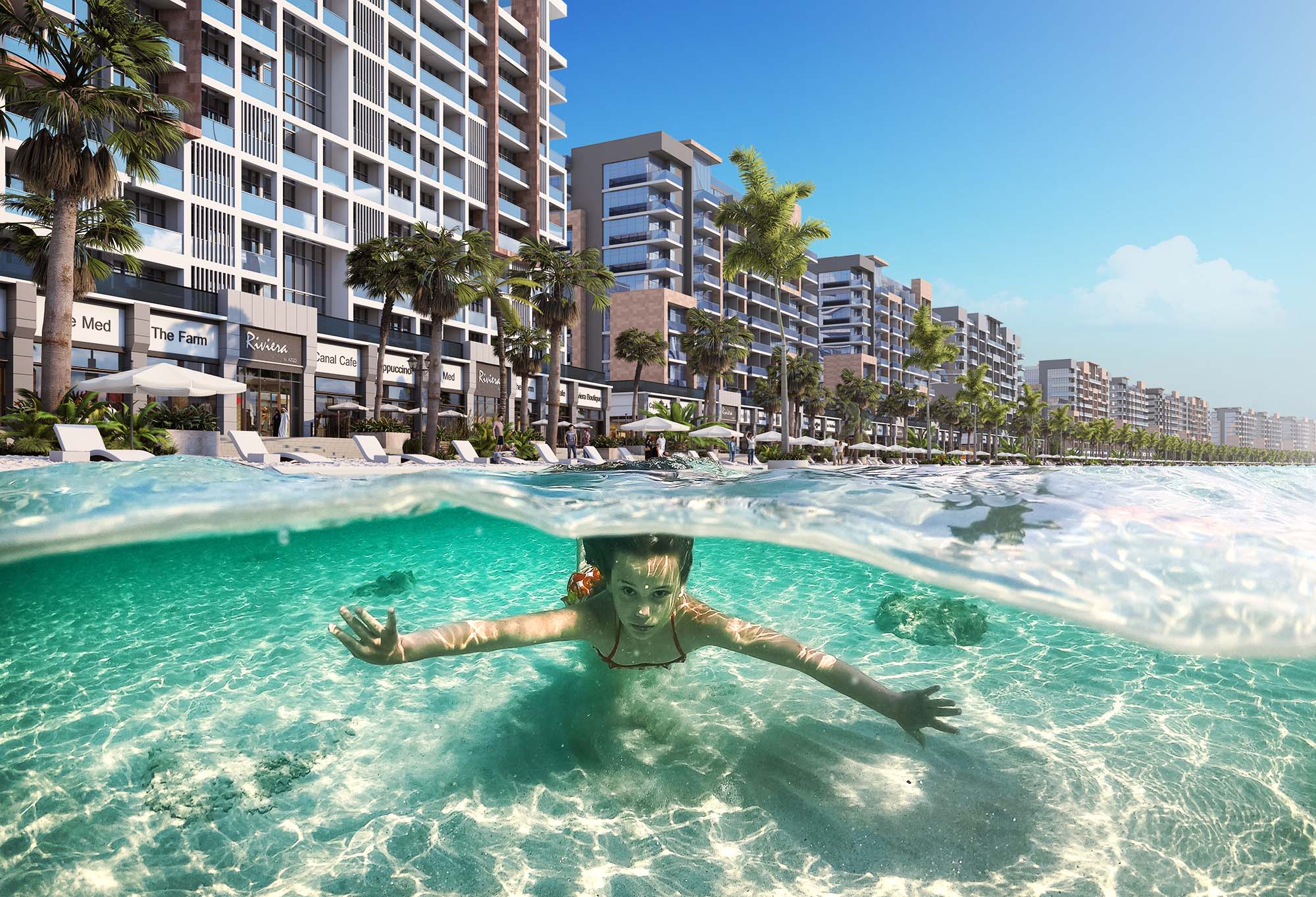 Girl swimming in crystal clear lagoon waters at Azizi Riviera with beachfront residences