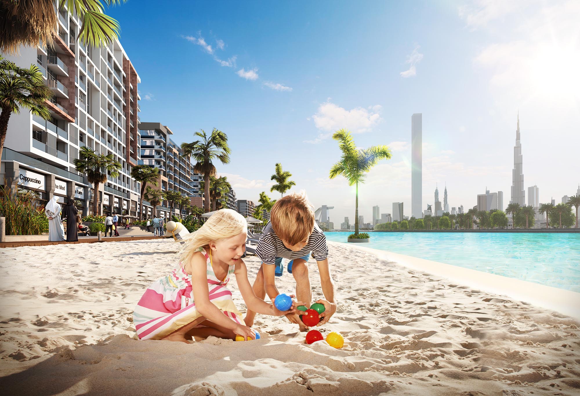 Children playing on sandy beach at Azizi Riviera lagoon with Dubai skyline